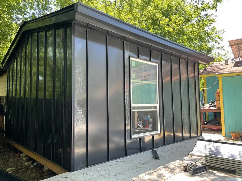 Black standing seam metal wall panels for Roof Inspection in Wheeling